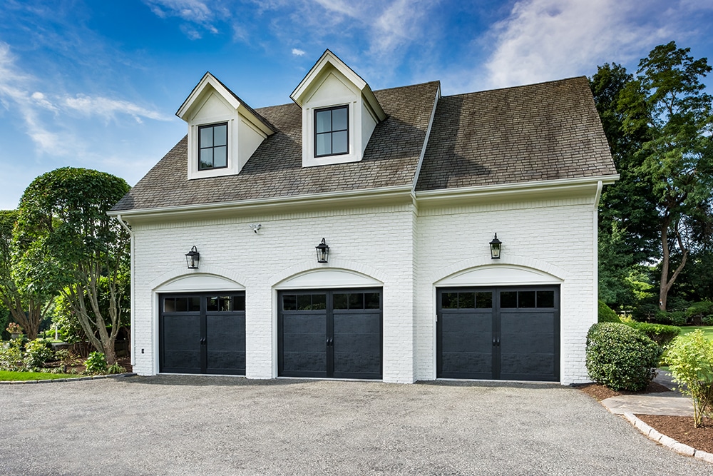 Awning windows featured on upper level of garage
